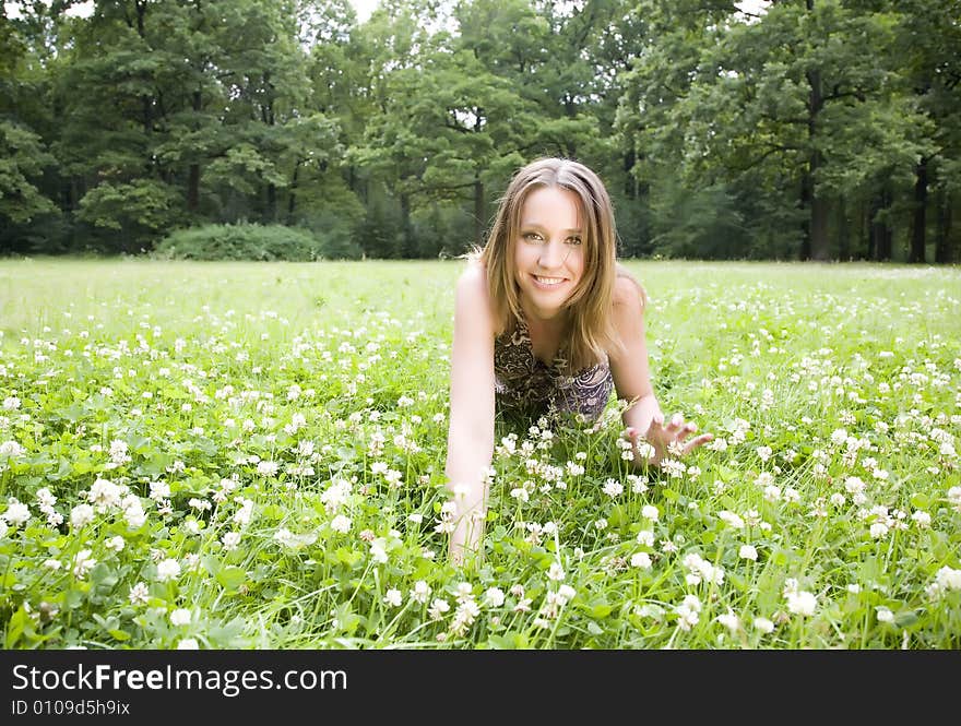 Young Beauty Women Laying On The Grass