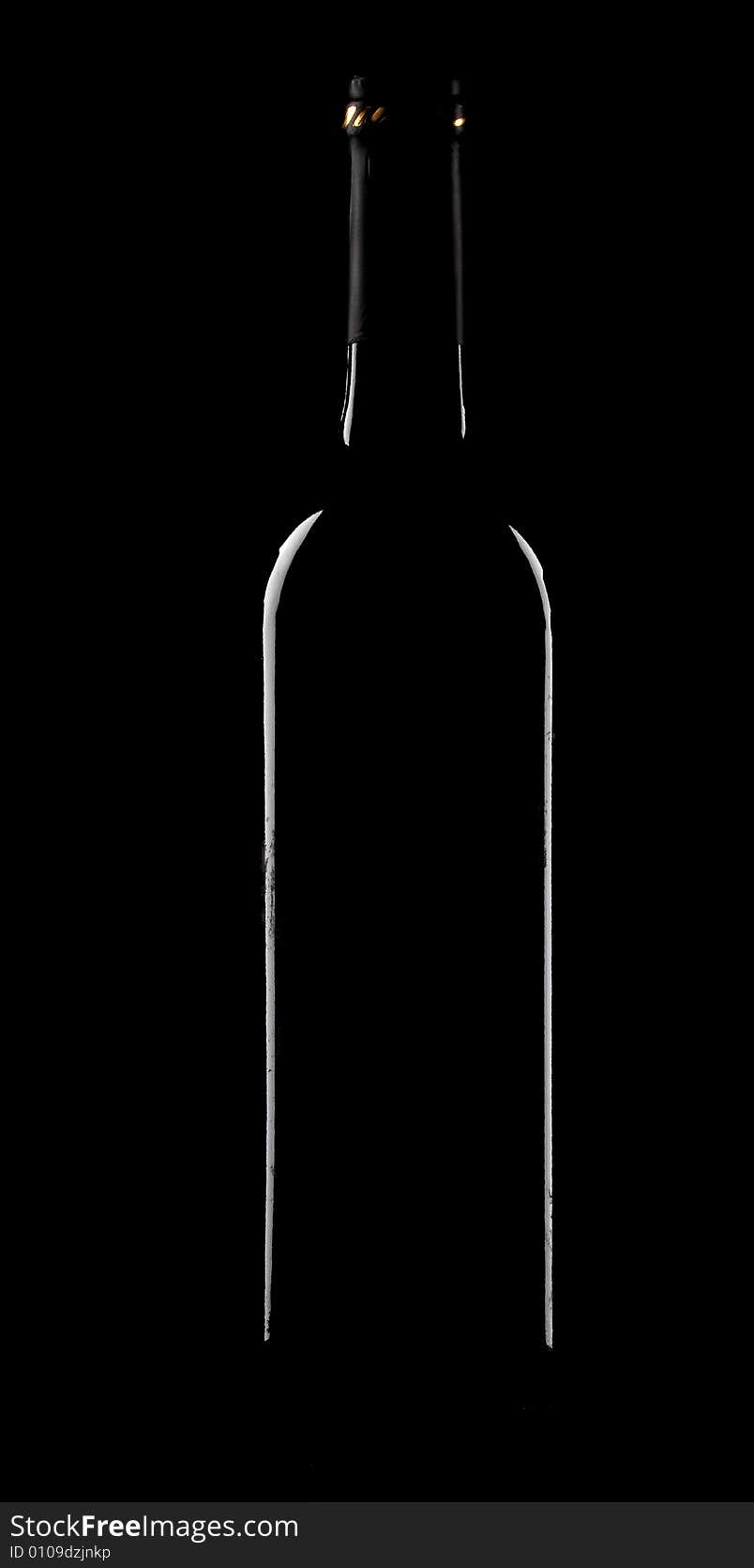 Contour of bottle on black background