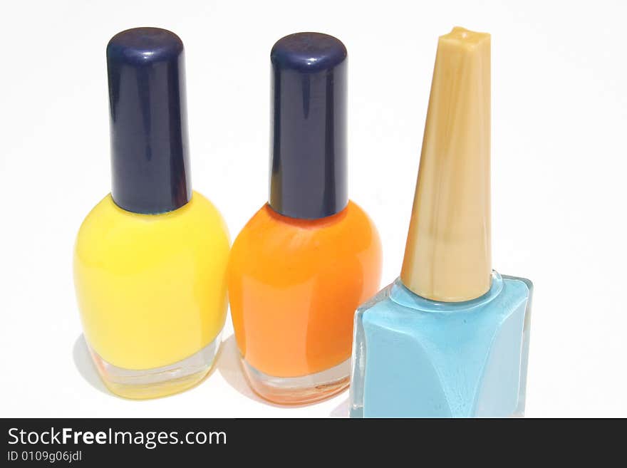 Nail polish bottles isolated against white background