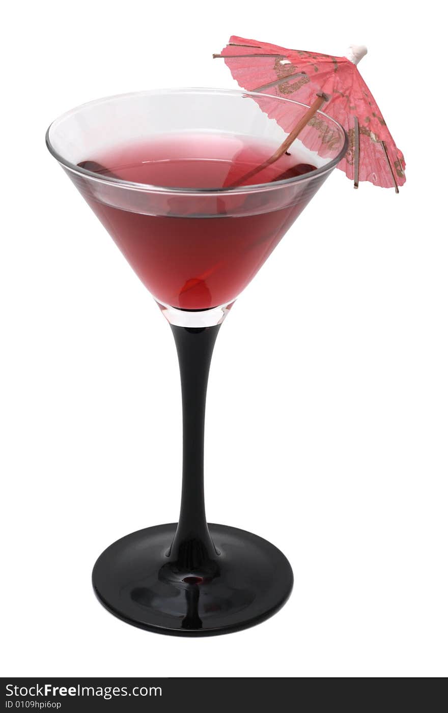 Red cocktail with an umbrella isolated on white background