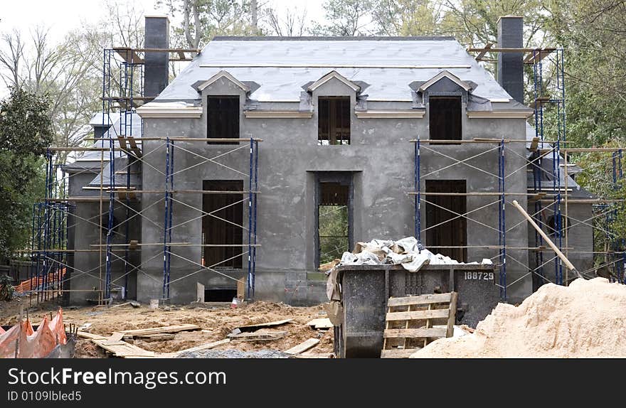 A new mansion under construction with concrete walls