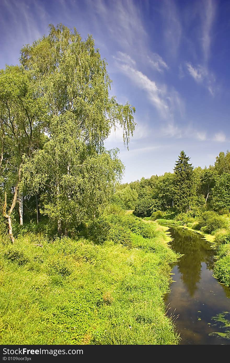 Landscape with blue sky, clouds, forest and lake. Landscape with blue sky, clouds, forest and lake