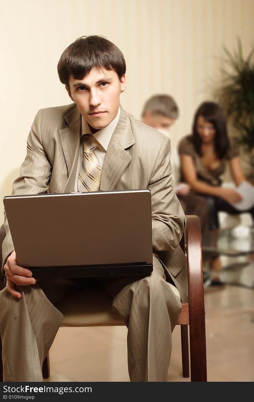 Group of business people working together in the office. Group of business people working together in the office.