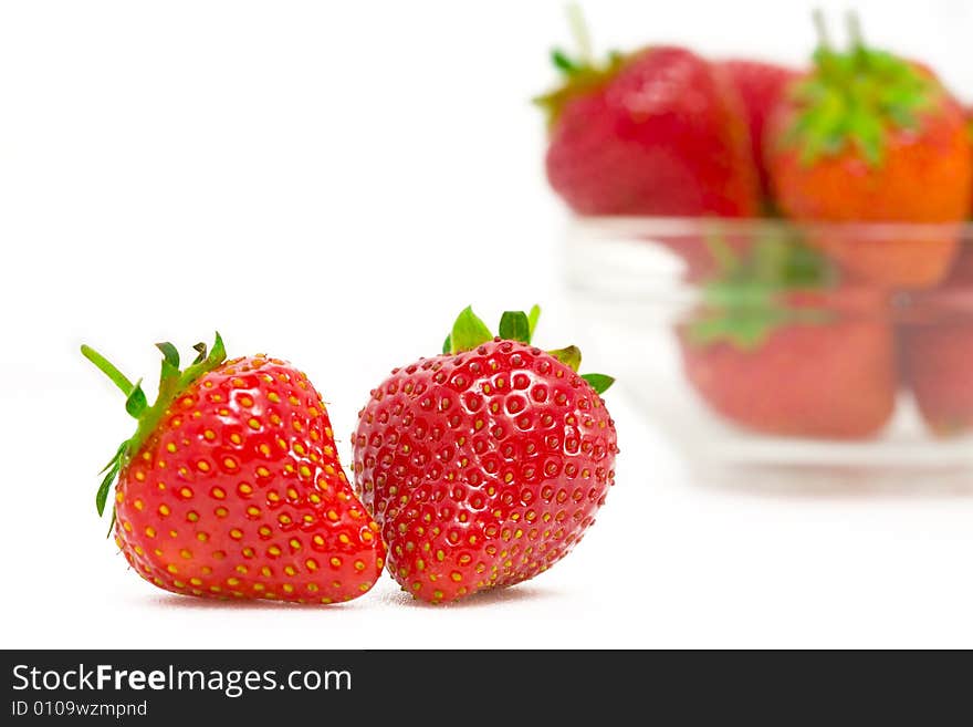 High key photo of fruit dish filled with nice red strawberries. High key photo of fruit dish filled with nice red strawberries