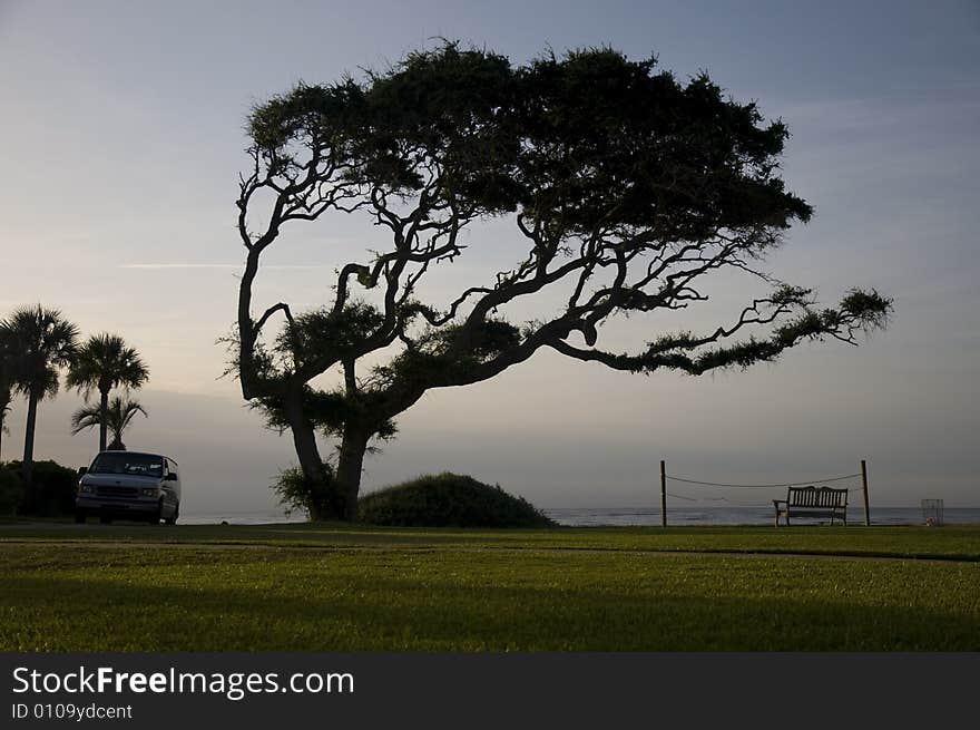 Picture of the sunrise over the beach front. Picture of the sunrise over the beach front