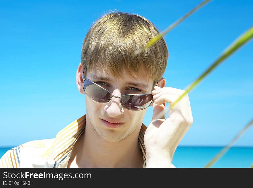 Portrait of young gorgeous male in outdoor environment. Portrait of young gorgeous male in outdoor environment