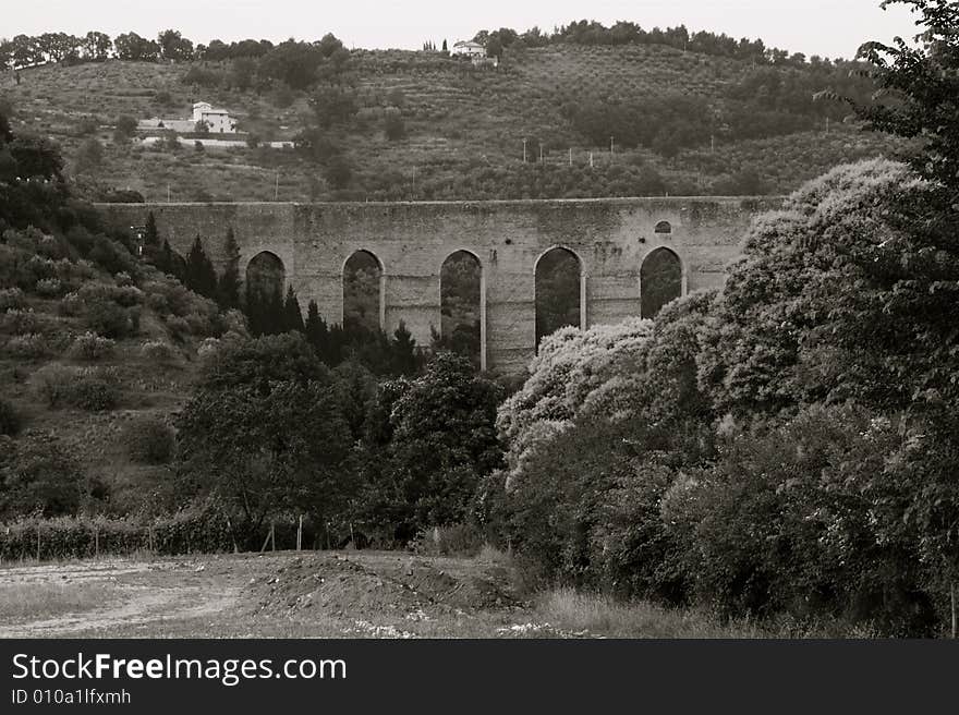 Medieval italian bridge on mountain side in Spoleto. Medieval italian bridge on mountain side in Spoleto