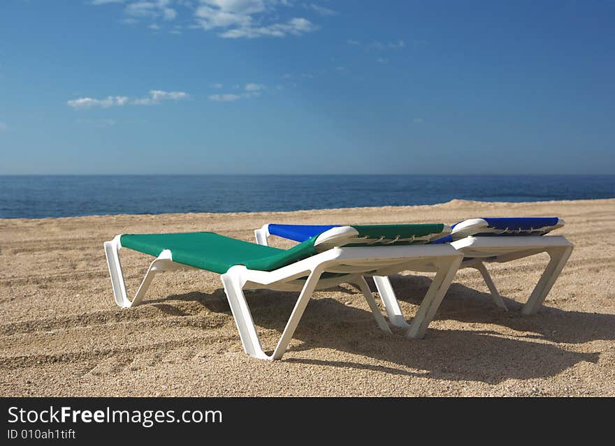 Two Chairs On The Beach