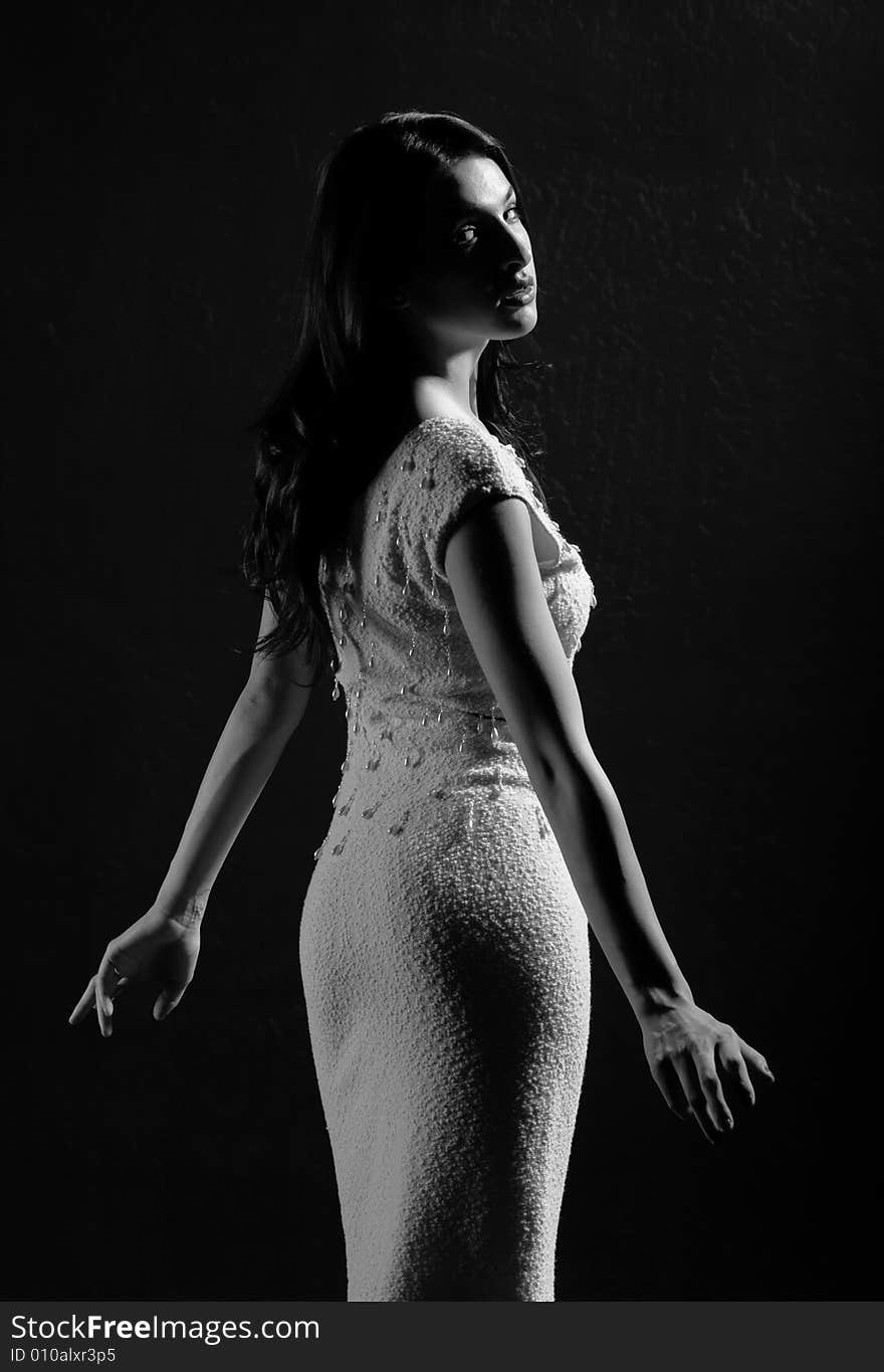 A young female model, photographed in the studio. A young female model, photographed in the studio.