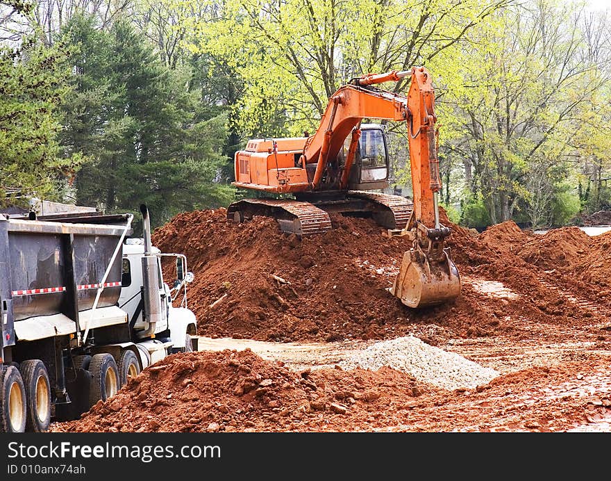 Orange Loader And Dump Truck