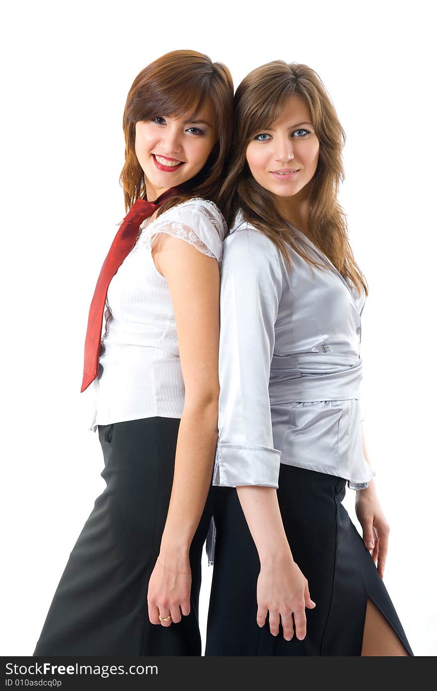 Two attractive businesswomen in team isolated on white background