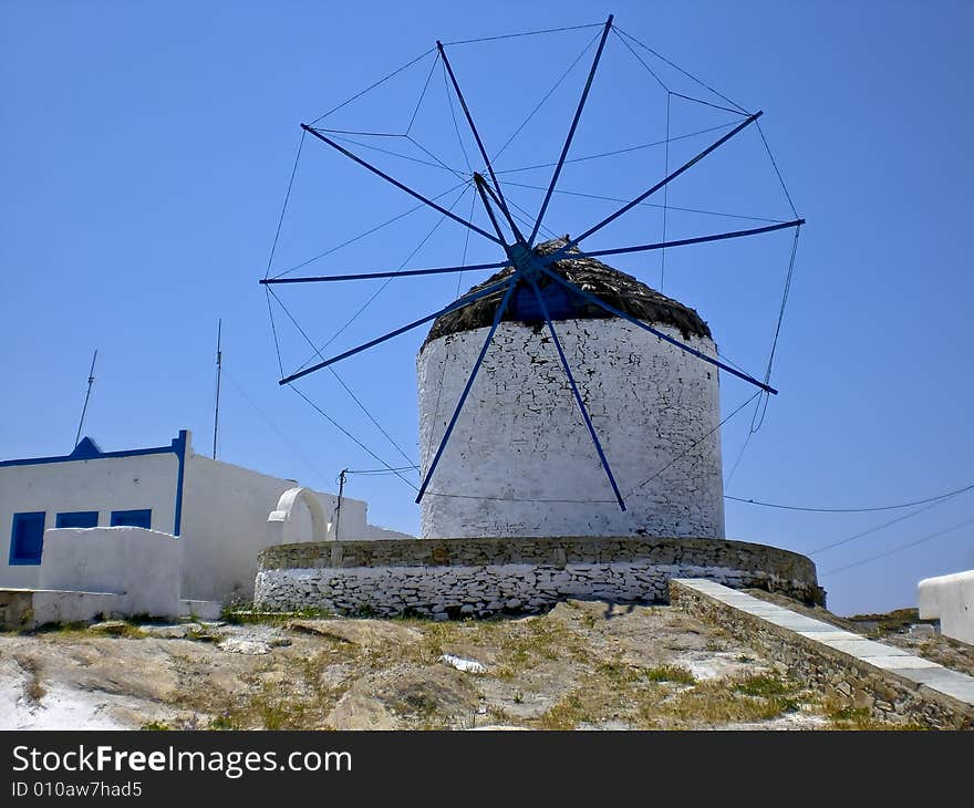 Old windmill in the village of Chora, on los Island. Old windmill in the village of Chora, on los Island.