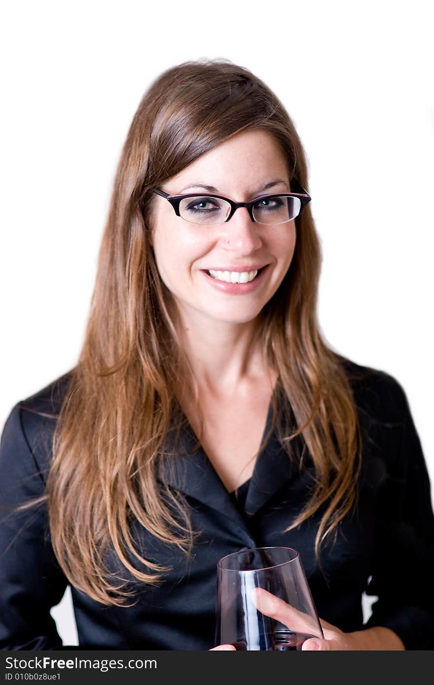 Woman smiling holding glass.