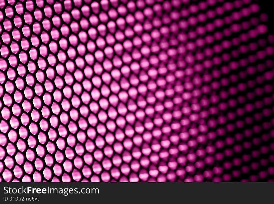 Metallic netting with lilac light in it. Metallic netting with lilac light in it