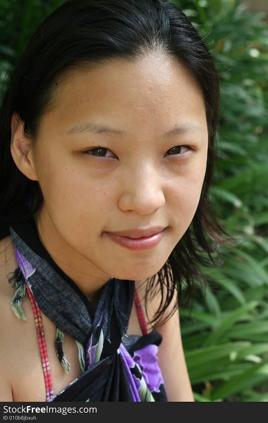 Close-up portrait of a pretty Korean woman. Close-up portrait of a pretty Korean woman.