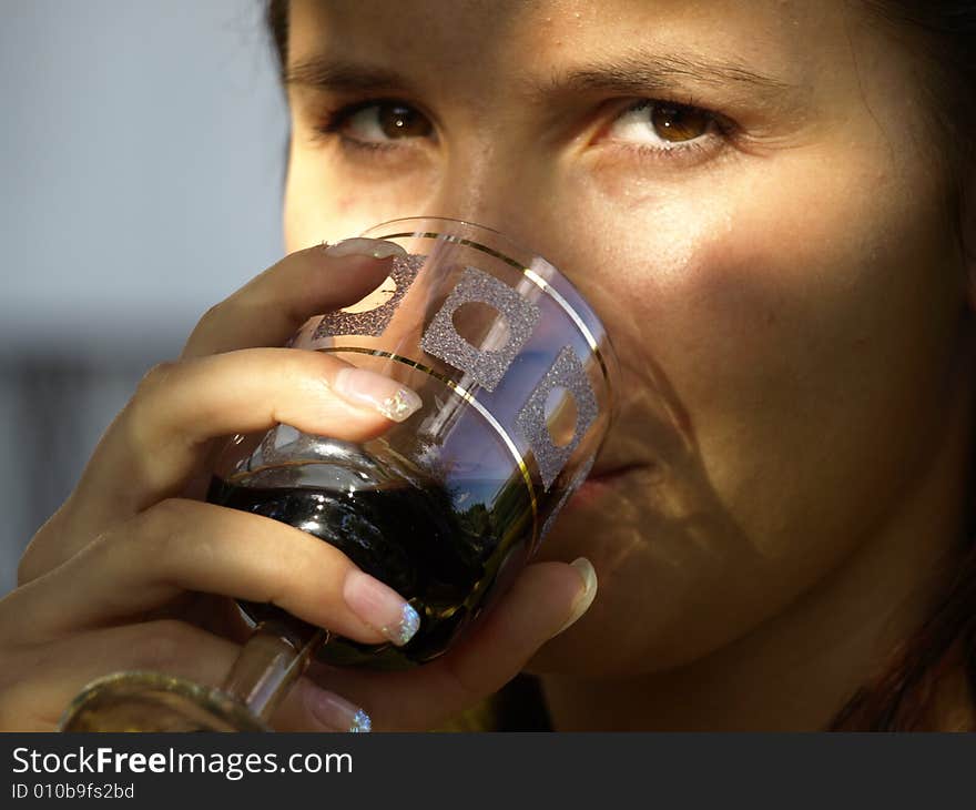 My sister drinking red wine. My sister drinking red wine.