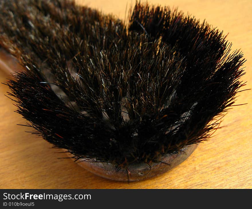 Brush shoes with black hair in isolated background