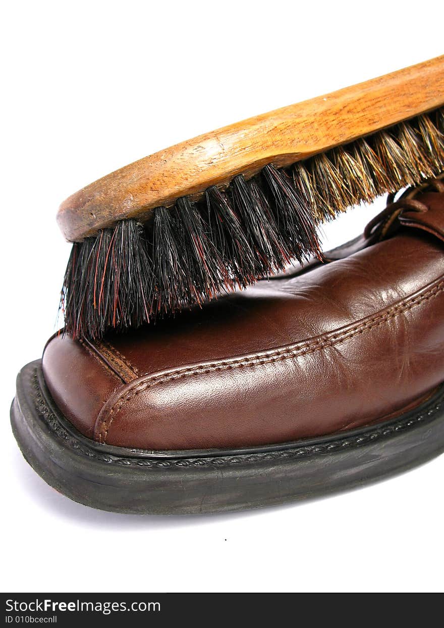 Clean brush and brown men shoe