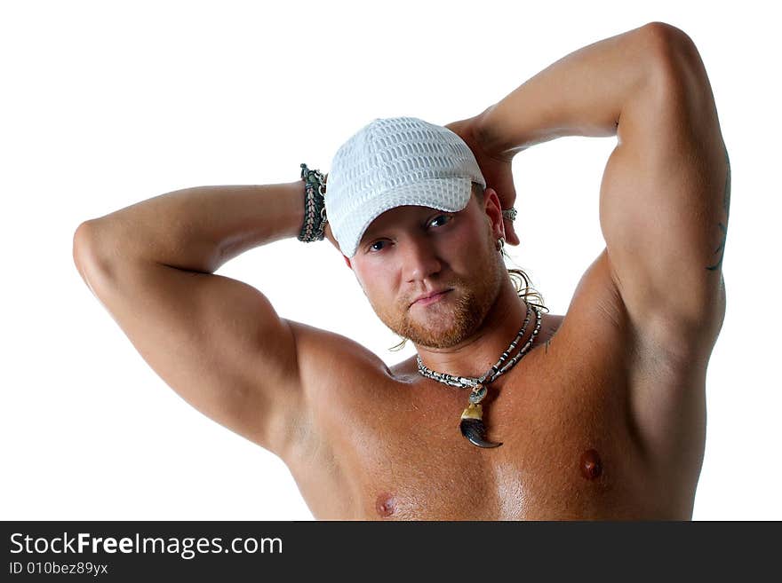 The young strong man on a white background