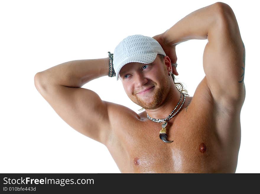 The young strong man on a white background