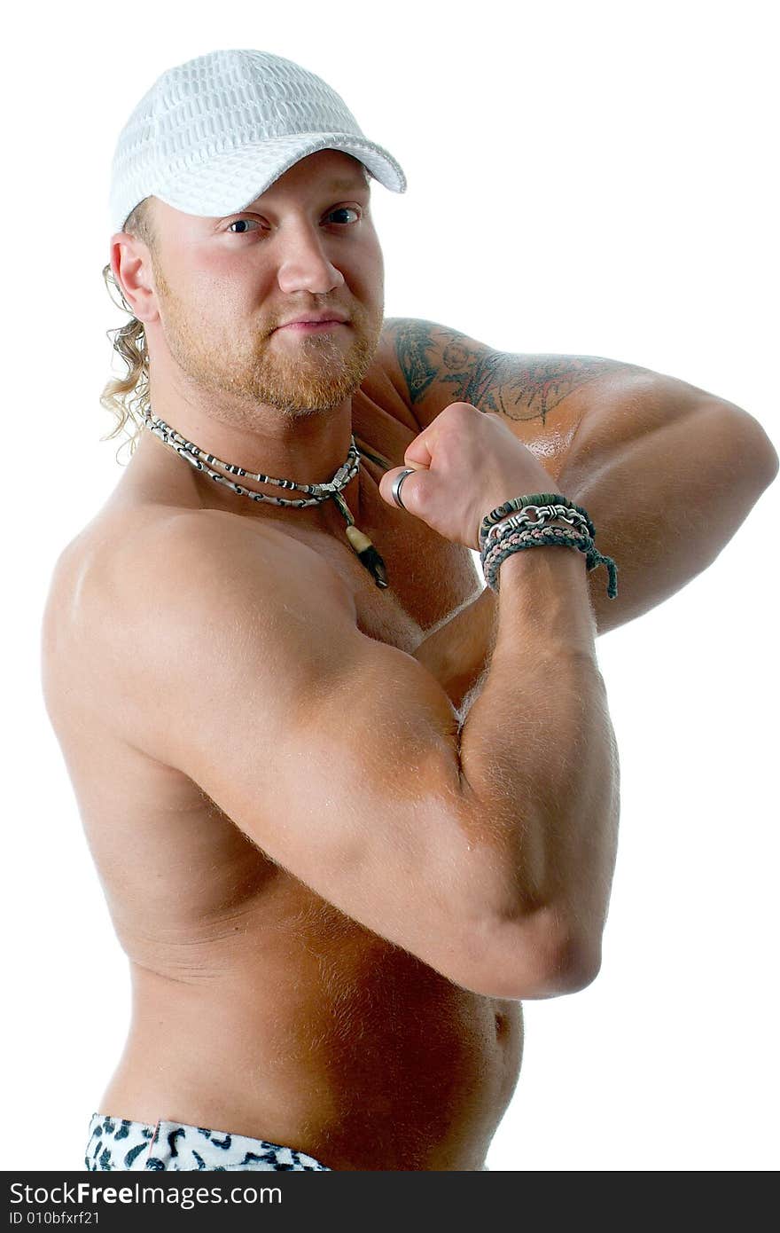 The young strong man on a white background