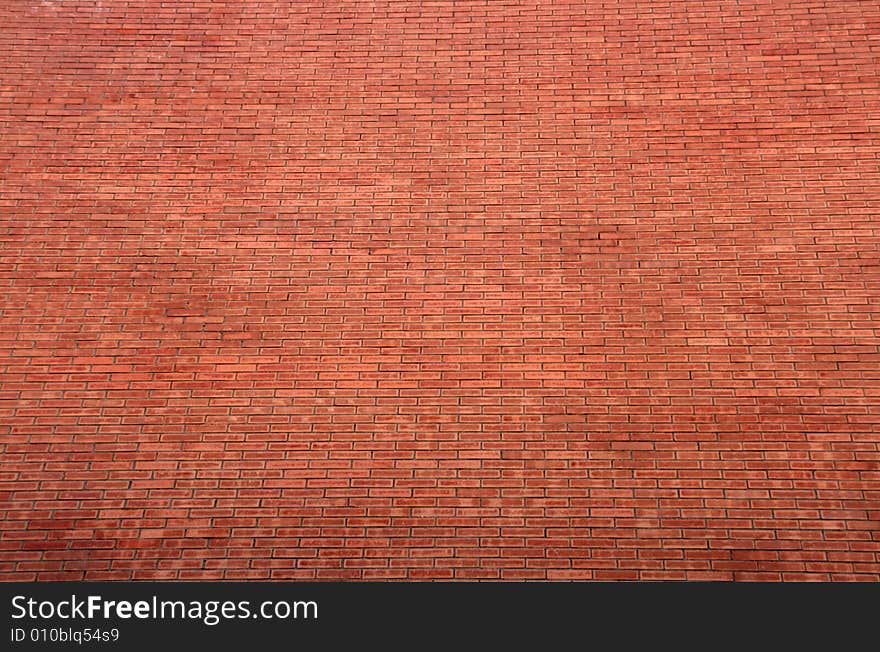 Background or pattern of a big red orange brick wall. Background or pattern of a big red orange brick wall