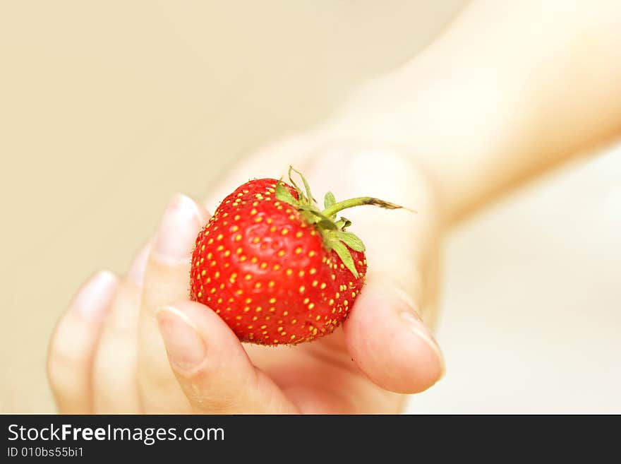 Strawberry in hand