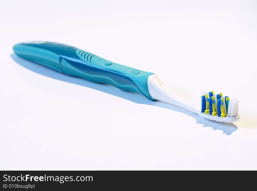 Electric toothbrush isolated on the white background