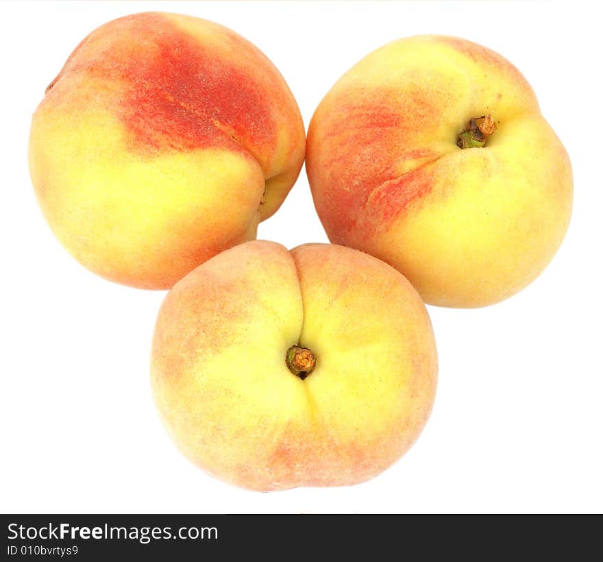 Nice fresh peaches isolated over white with clipping path