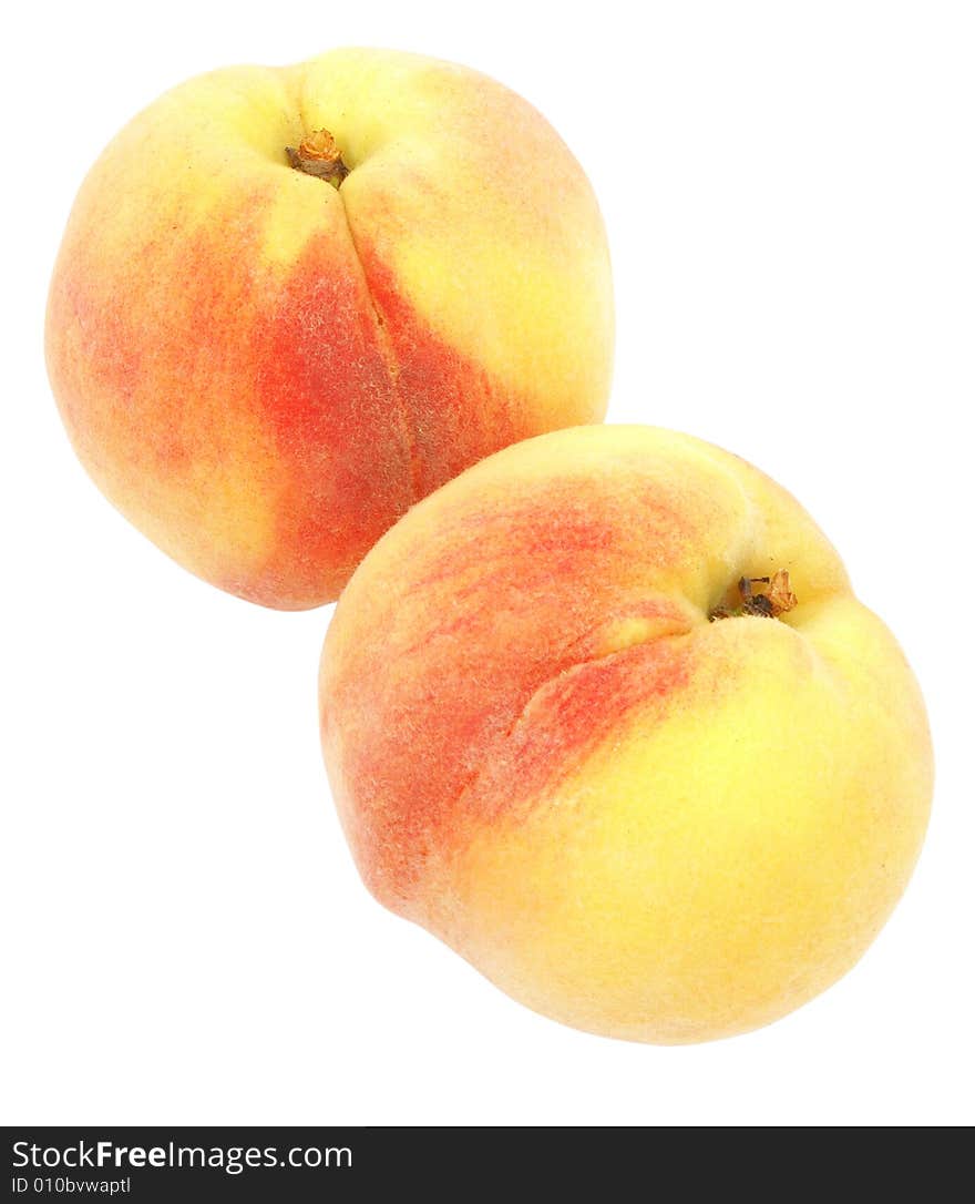 Nice fresh peaches isolated over white with clipping path