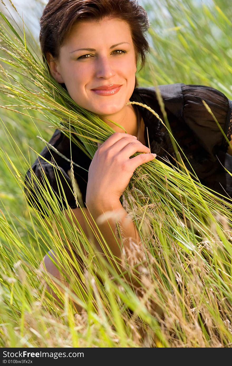 Young Caucasian Girl On Green Grass