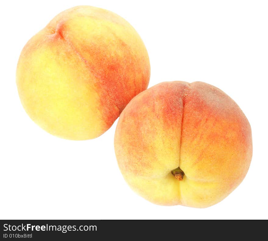 Nice fresh peaches isolated over white with clipping path