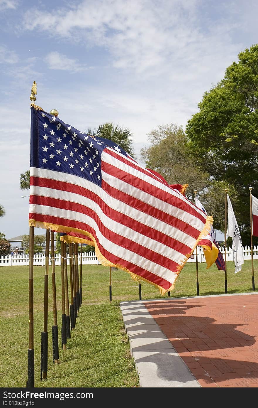 A line of historic flags at a public display. A line of historic flags at a public display