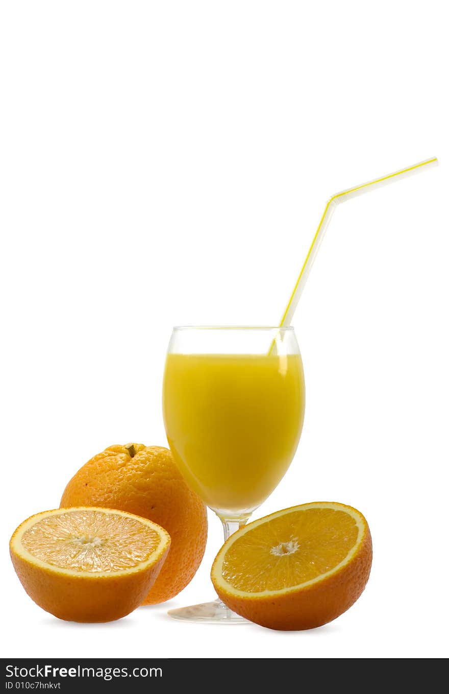 Glass of fresh juice and oranges on a white background. Glass of fresh juice and oranges on a white background