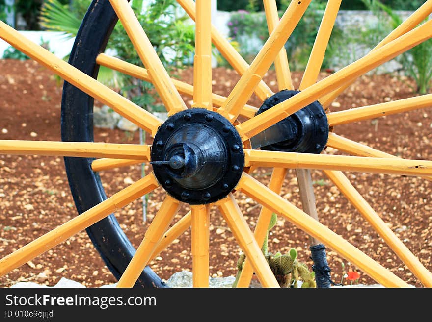 Close up on an Old Antique Wagon Wheel. Close up on an Old Antique Wagon Wheel