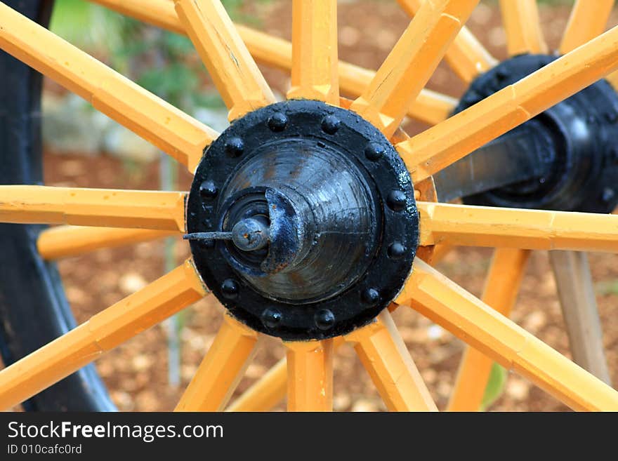 Close up on an Old Antique Wagon Wheel. Close up on an Old Antique Wagon Wheel