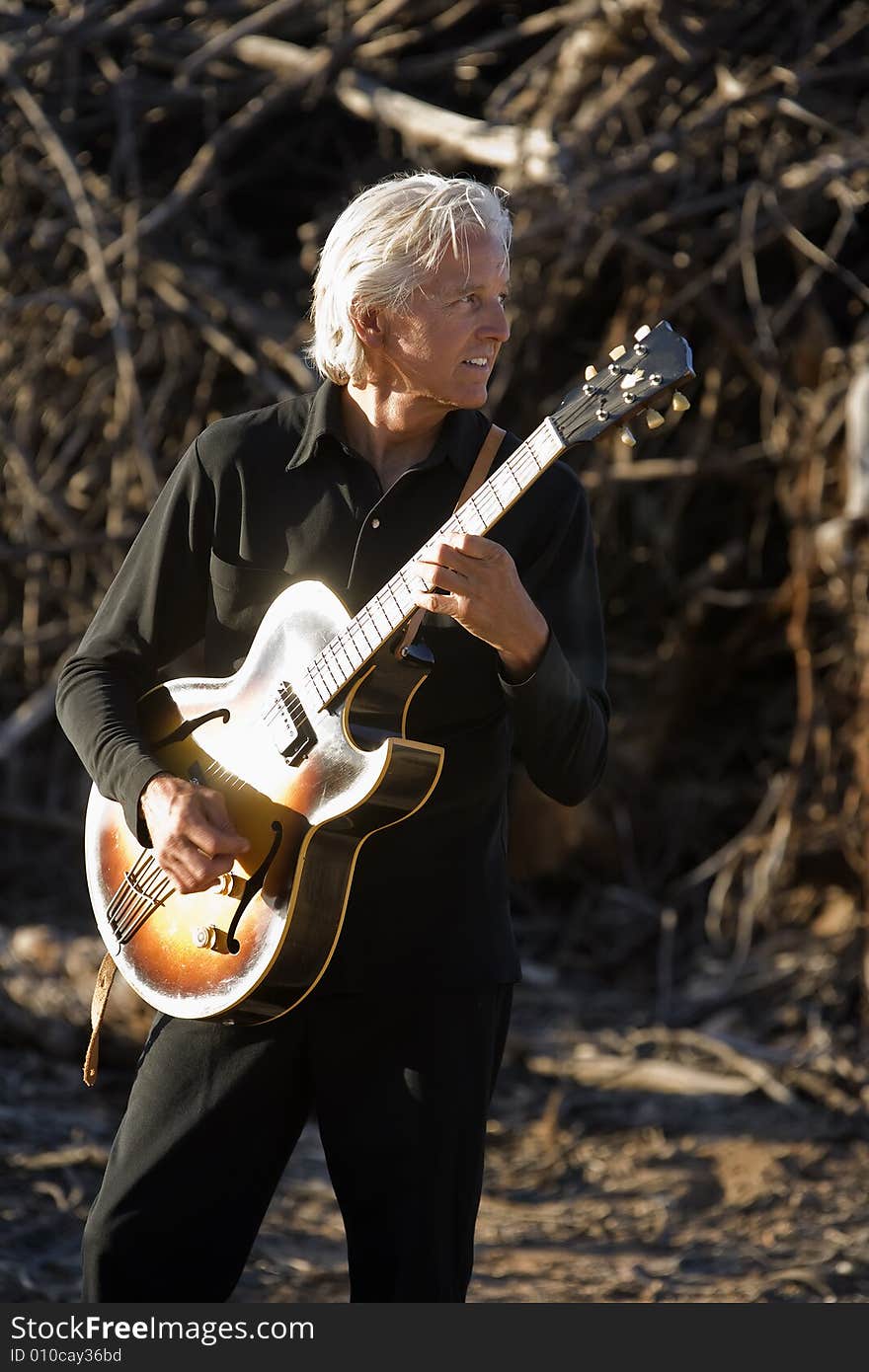 Electric Guitar Player Outdoors