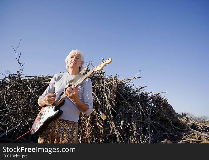 Electric Guitar Player Outdoors