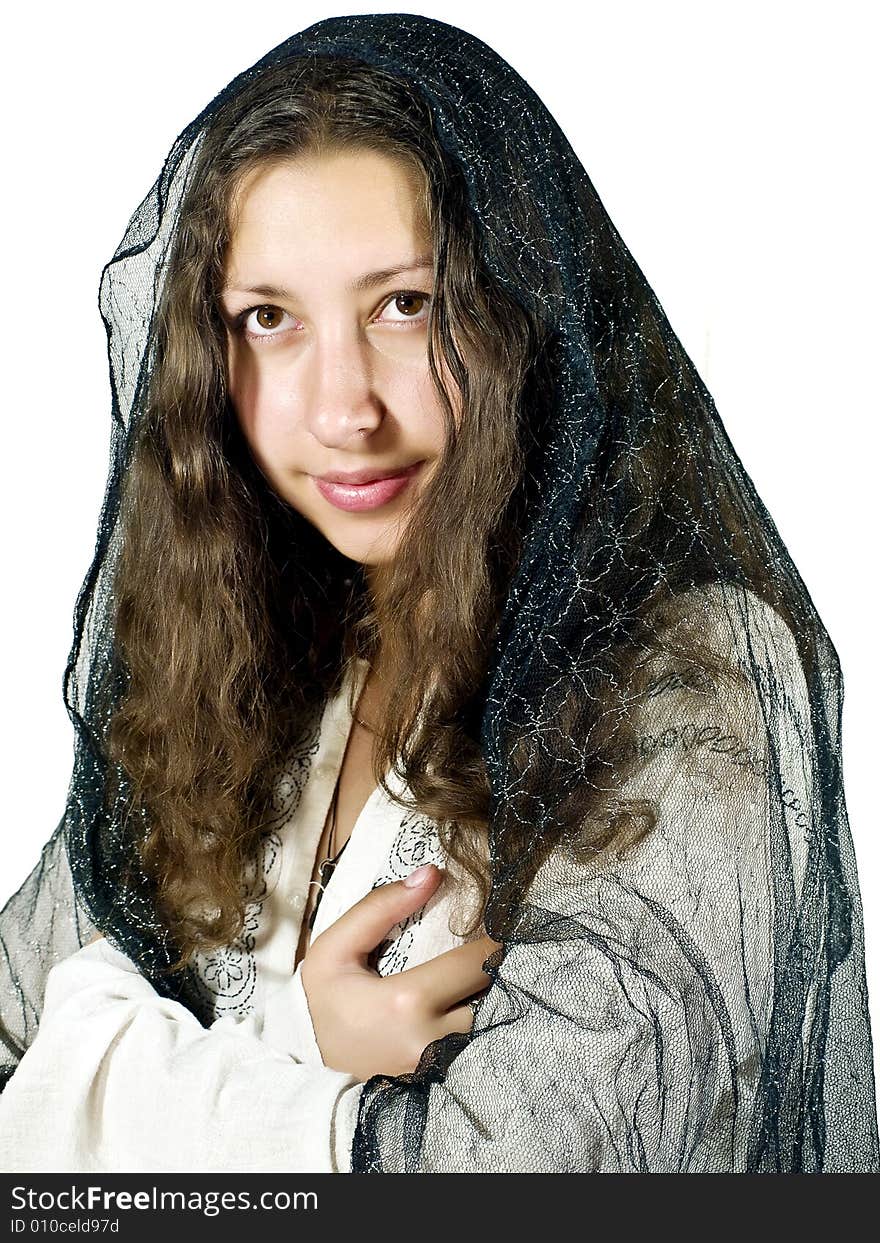 Portrait of pretty girl with the sheer scarf on the hair