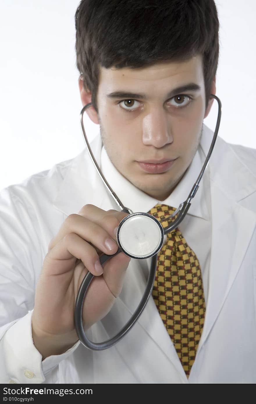 Young doctor with overall and stethoscope