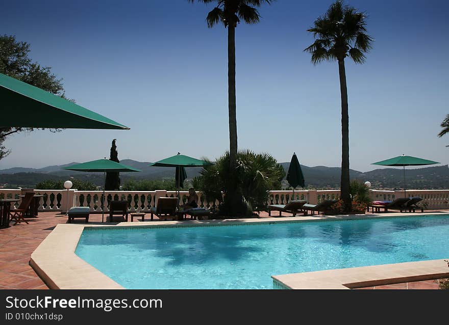 Poolside at bormes les mimosas, french riviera, france. Poolside at bormes les mimosas, french riviera, france