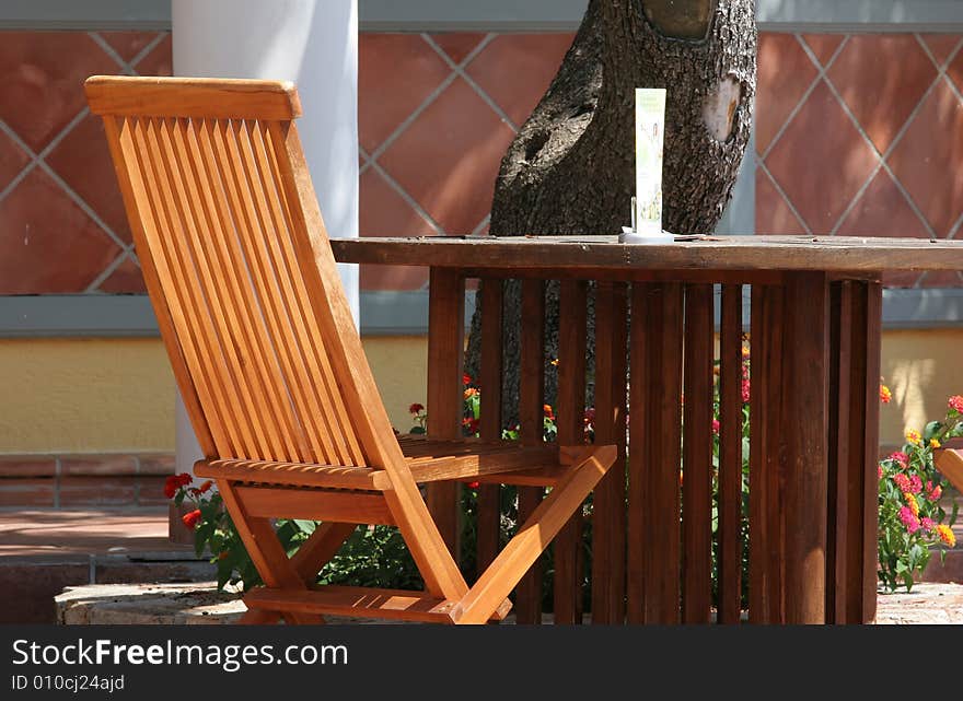 Restaurant table on sunny terrace.