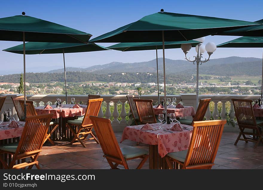 Restaurant Table On Sunny Terrace.