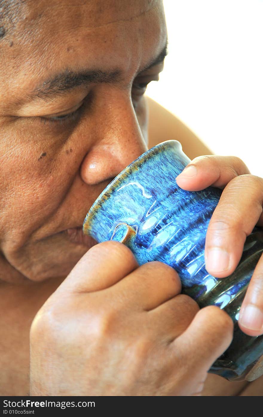 Portrait of an african american man relaxing at home. Portrait of an african american man relaxing at home.