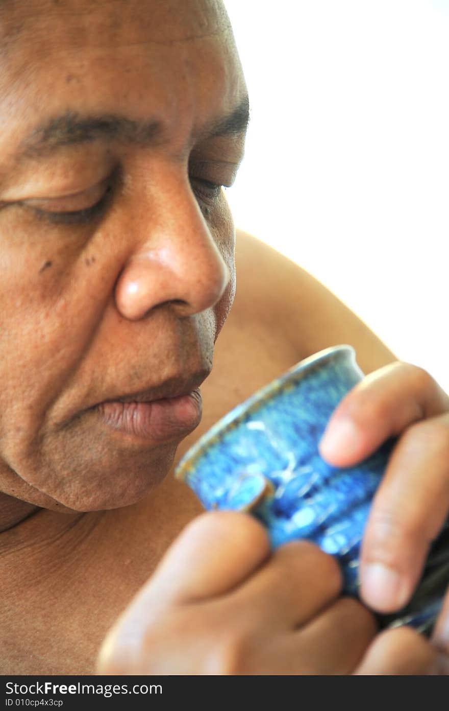 Portrait of an african american man relaxing at home. Portrait of an african american man relaxing at home.