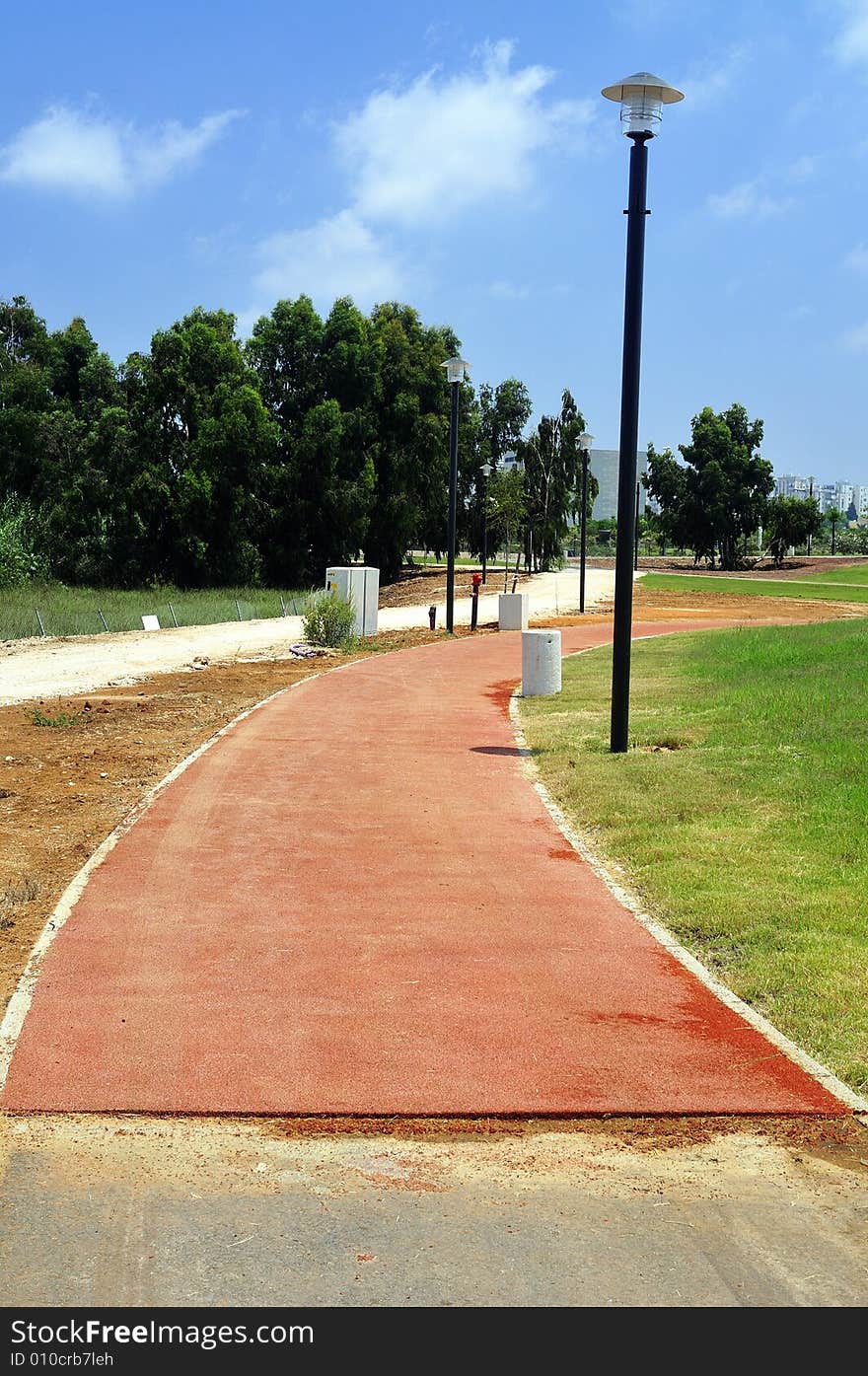 Track with rubber-band covering for walking and harness racing. Track with rubber-band covering for walking and harness racing