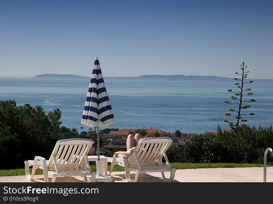 Poolside on the sea at le lavandou azur hotel  french riviera, france. Poolside on the sea at le lavandou azur hotel  french riviera, france