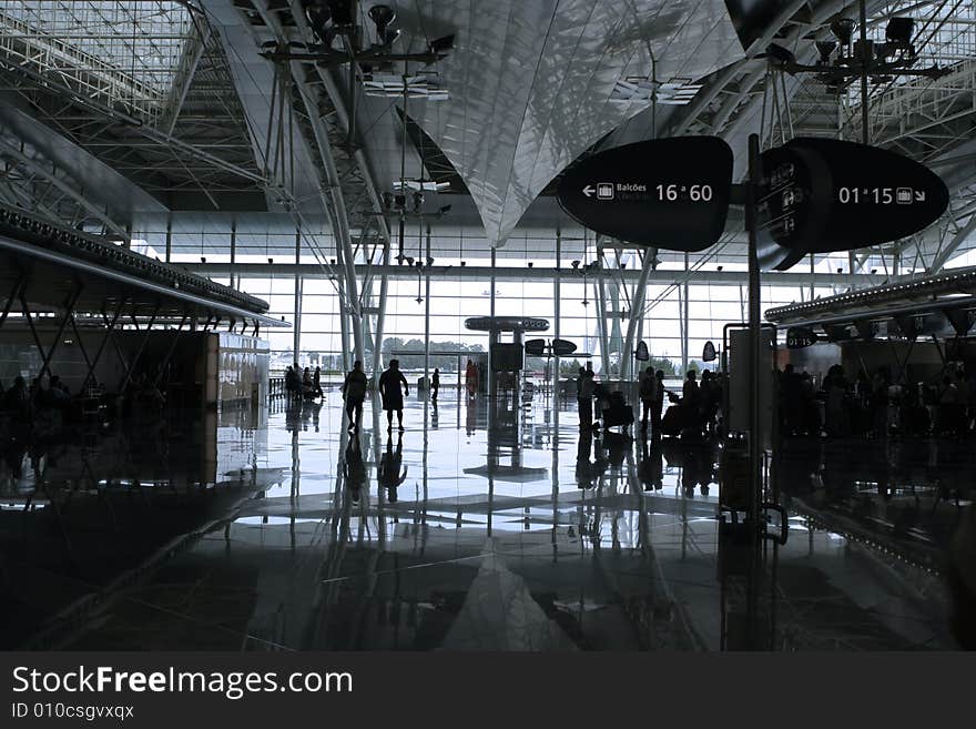 People waiting in the airport. People waiting in the airport