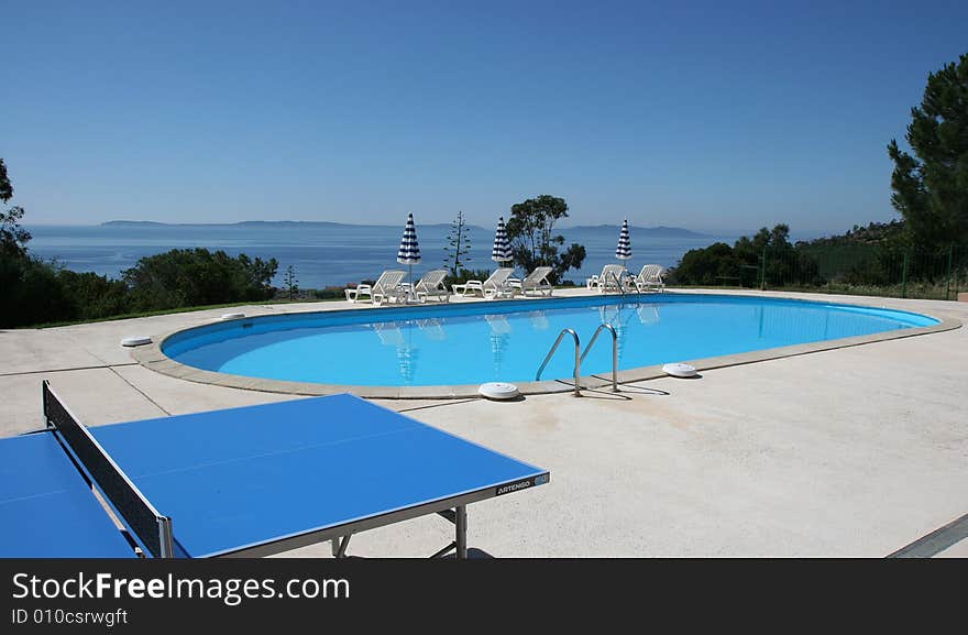 Poolside on the sea at le lavandou azur hotel  french riviera, france, ping pong table. Poolside on the sea at le lavandou azur hotel  french riviera, france, ping pong table