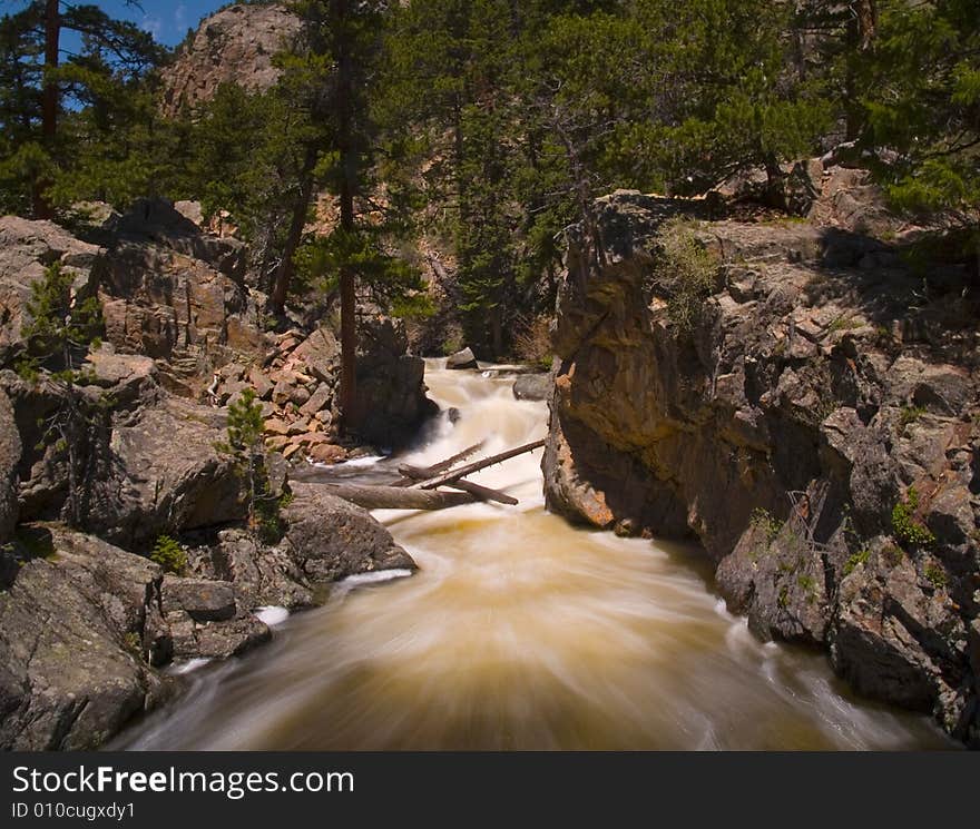 Rapids rushing down the Big Thompson River in the Rocky Mountains. Rapids rushing down the Big Thompson River in the Rocky Mountains.